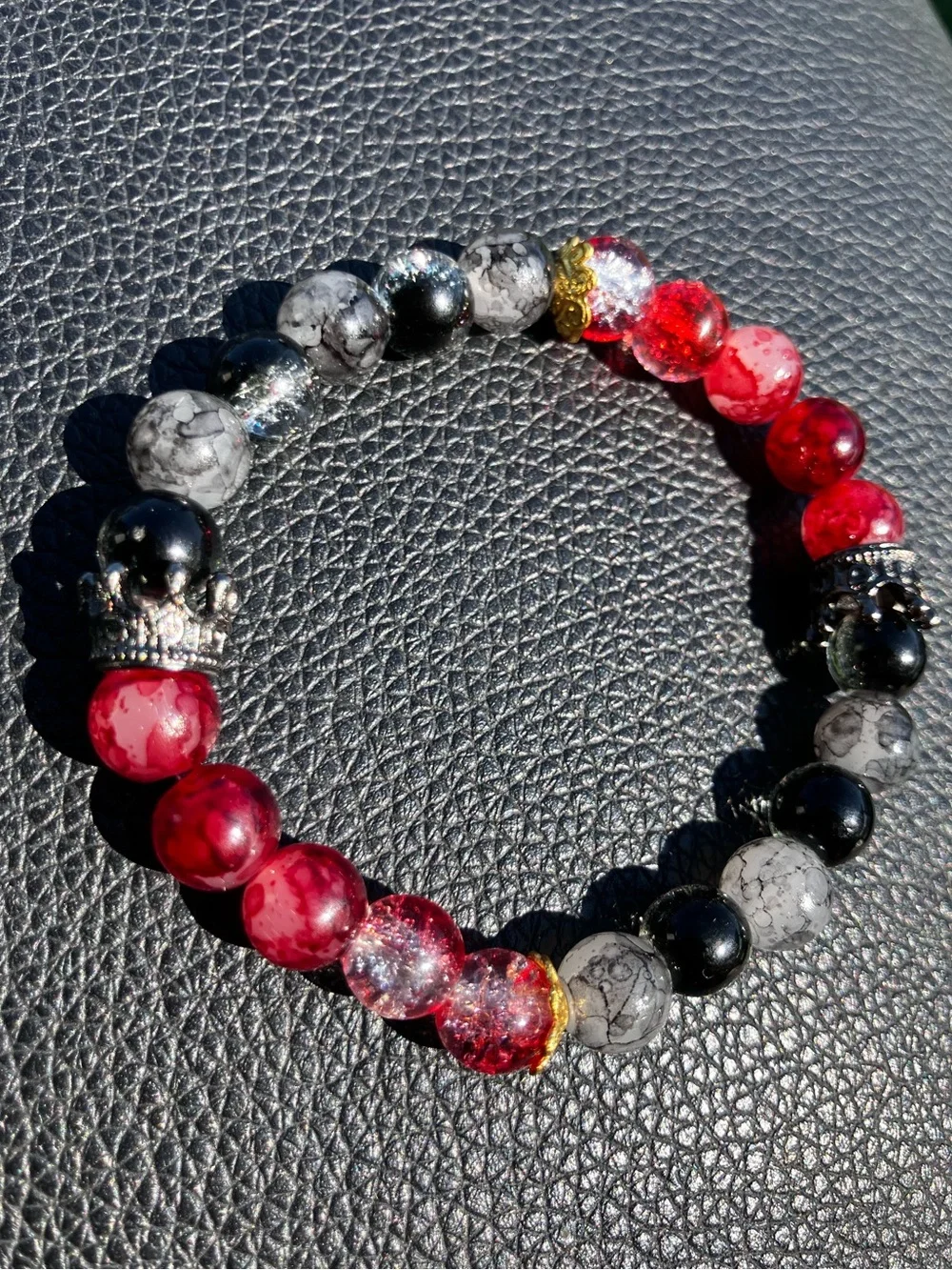 Black and red with black crown and gold accent glass beaded bracelet
